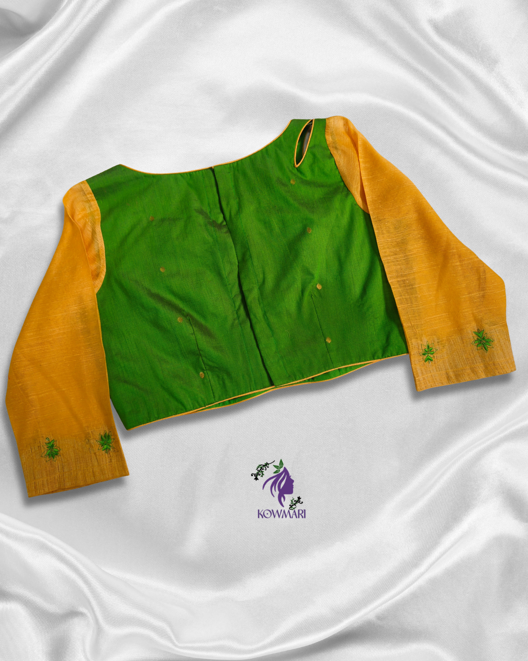 silk blouse featuring contrasting khadhi