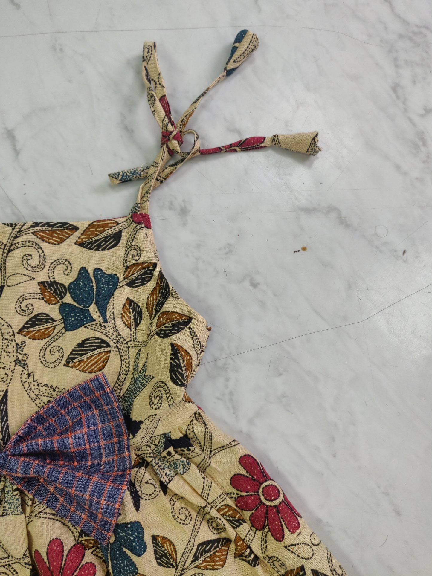 Handcrafted Baby Frock with Shoulder Ties & Bow – Multicolor Floral Print (3-6 Months)