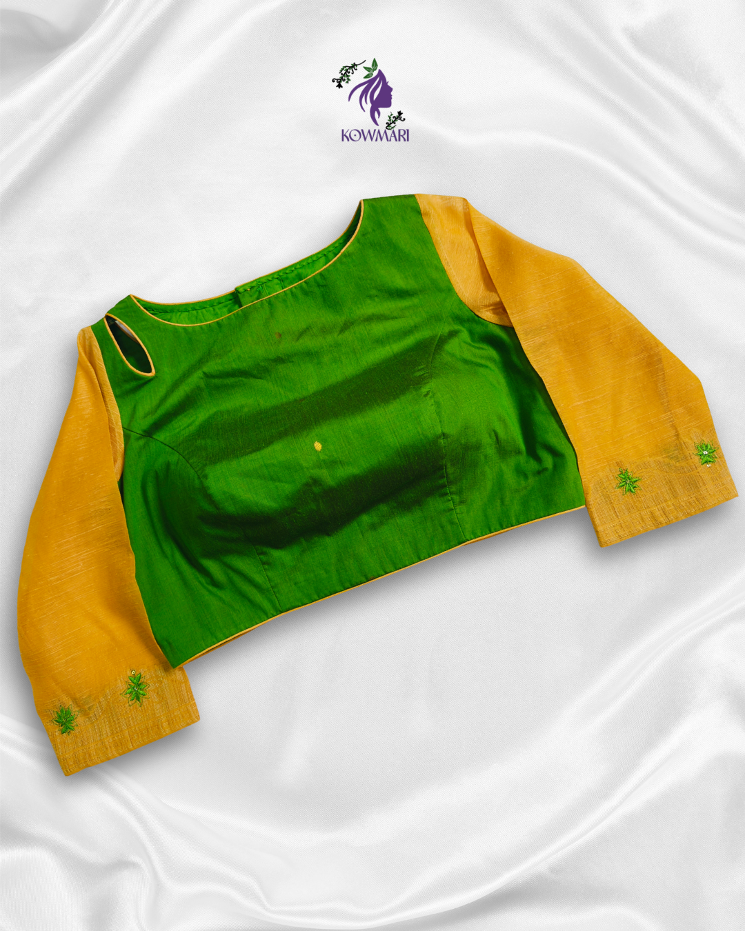 silk blouse featuring contrasting khadhi