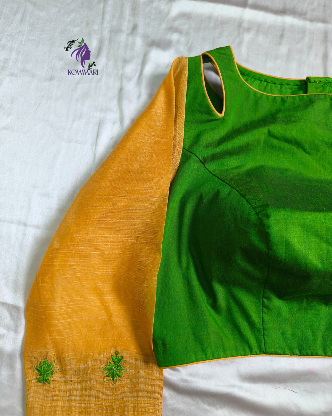 silk blouse featuring contrasting khadhi